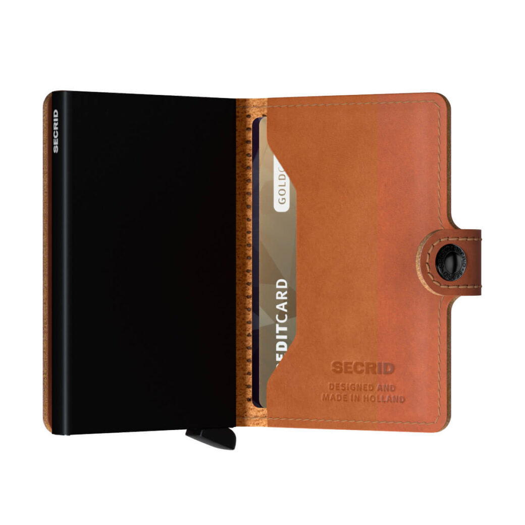 Secrid rei'itetty ruskea lompakko - Miniwallet Perforated Cognac-225629